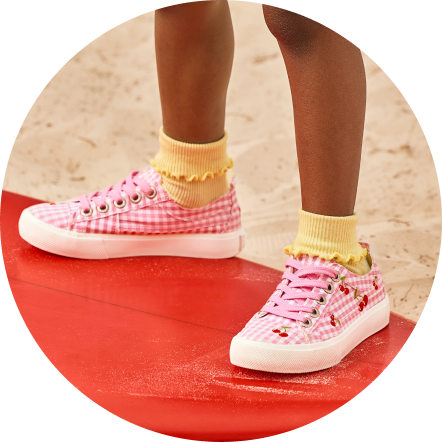 Venice-inspired casual shoes displayed on neutral tones